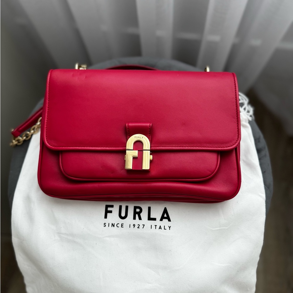 Furla 1927 Women Handbag in red/berry color. Genuine Leather.